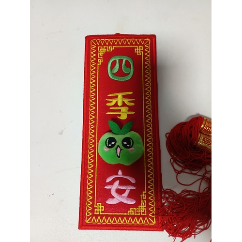 285 - A tall, hand-carved wooden standing Buddha statue, 2 Buddha heads, 2 red Chinese New Year tassel orn... 