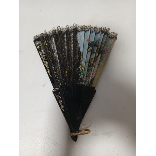 290 - A collection of fans all different size and styles.