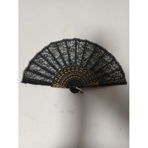 290 - A collection of fans all different size and styles.