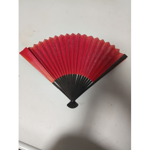 290 - A collection of fans all different size and styles.