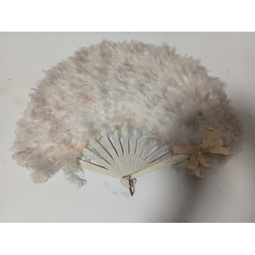 290 - A collection of fans all different size and styles.