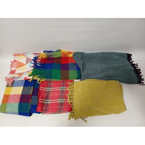 292 - A collection of 6 vintage blankets, all with different colours and patterns.