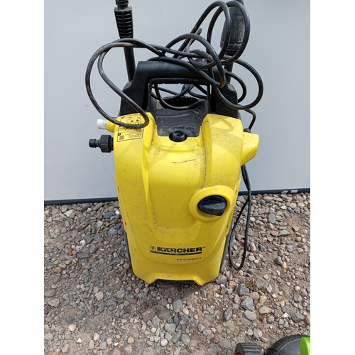 195 - A working electric one handed lawn mower & a Archer K4 compact jet wash from a house clearance, unte... 