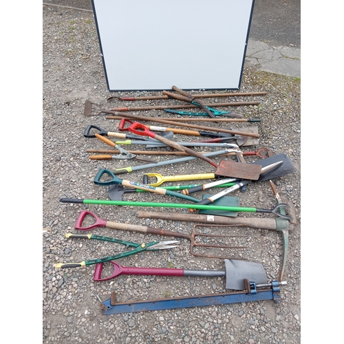 198 - A joblot of gardening tools. To include hedge trimmers, shovels, pickaxe, pitch fork etc...