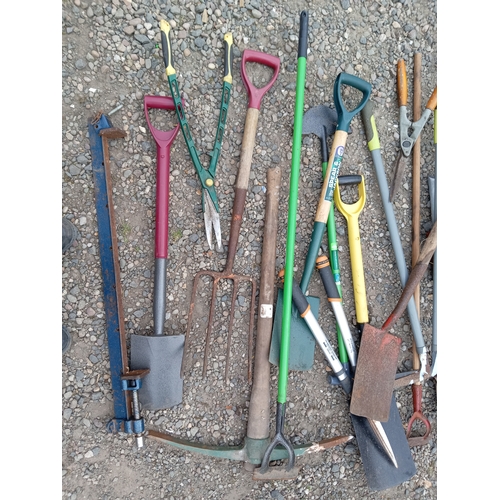 198 - A joblot of gardening tools. To include hedge trimmers, shovels, pickaxe, pitch fork etc...