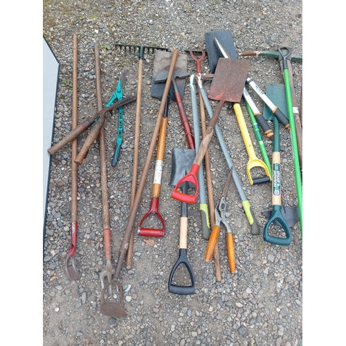 198 - A joblot of gardening tools. To include hedge trimmers, shovels, pickaxe, pitch fork etc...