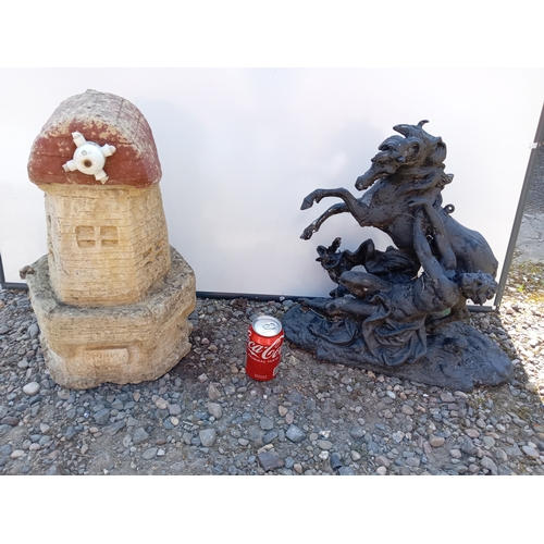 178 - A pair of garden ornaments. To include classical style statue of a horse & a man & a windmill orname... 