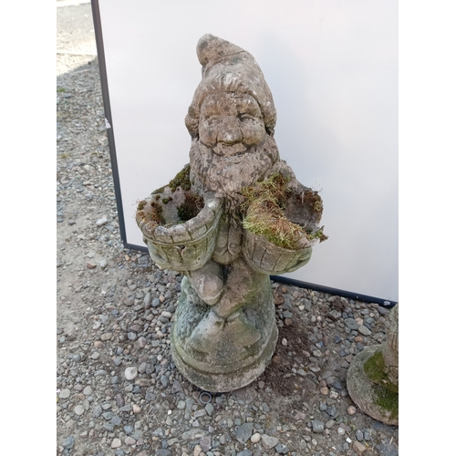 182 - A trio of garden gnomes statues.