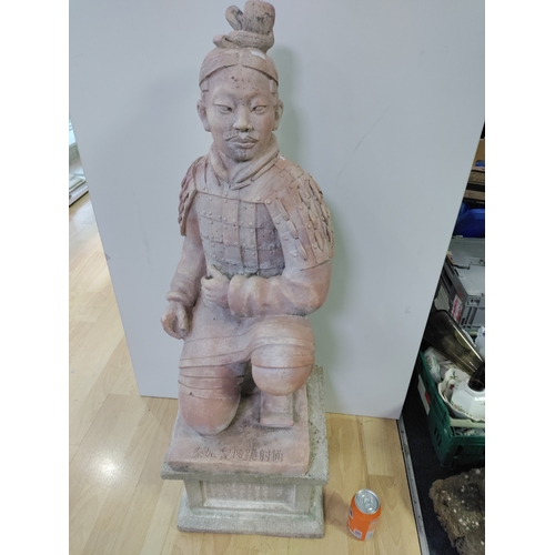 190 - A very large and heavy kneeling terracotta soldier on a plinth. ( Height 102 cm x Width 35 cm x Dept... 