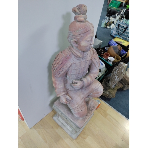 190 - A very large and heavy kneeling terracotta soldier on a plinth. ( Height 102 cm x Width 35 cm x Dept... 