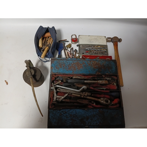 171 - A collection of hand tools. To include, hammers, carpenter scribs, an oil can and more.
