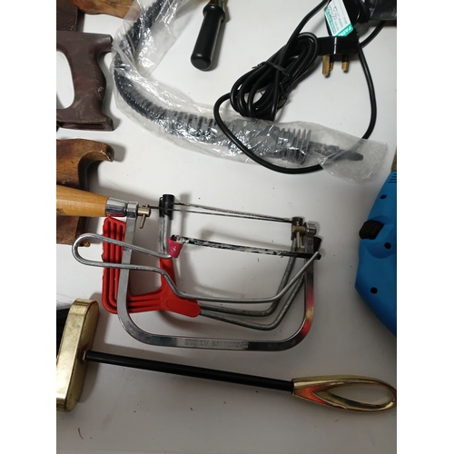 172 - A collection of tools to include, hand saws, levels, a sander, a spray gun and more.