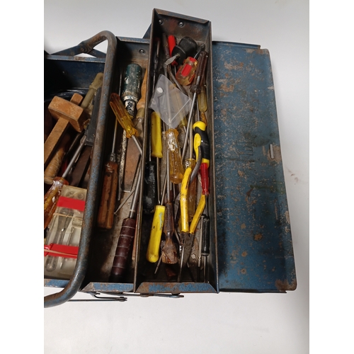 174 - A vintage blue metal cantilever toolbox full of tools such as, pliers, screwdrivers, a scraper and m... 
