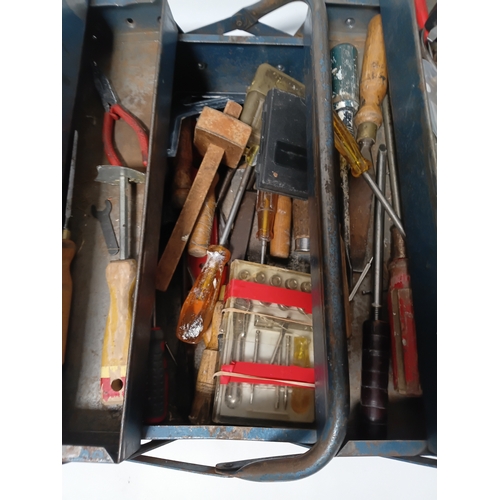 174 - A vintage blue metal cantilever toolbox full of tools such as, pliers, screwdrivers, a scraper and m... 