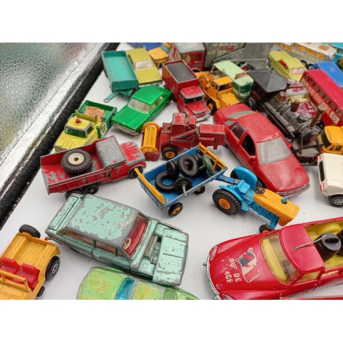 160 - A large collection of vintage diecast toy cars contains Matchbox models ,Corgi, Dinky, and Majorette... 