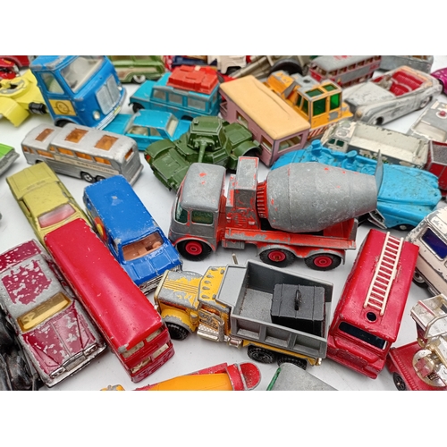 160 - A large collection of vintage diecast toy cars contains Matchbox models ,Corgi, Dinky, and Majorette... 