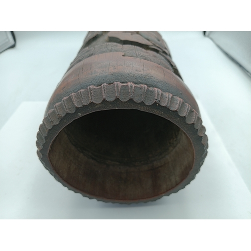 295 - An antique Chinese decorative hand carved bamboo brush pot. Height 18 inches x diameter 5 inches