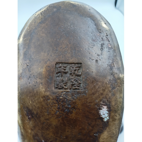 298 - A vintage Chinese bronze tea pot depicting a lucky fish. Height 8 inches x Width 9 inches