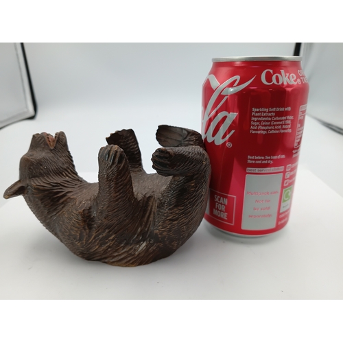 301 - A hand carved black forest bear from the Swiss or German regions of the black forest. Height 3 inche... 