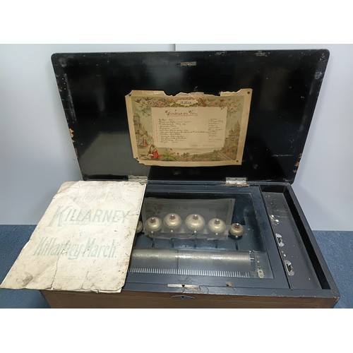 202 - Late 19th/early 20th century cylinder musical box in a rectangular ebonised and walnut-veneered case... 