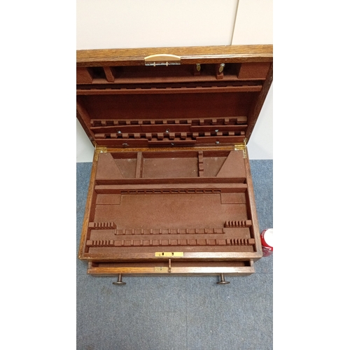 1 - Oak canteen with hinged lid and fall-front drawer, the interior fitted with velvet-lined partitions,... 