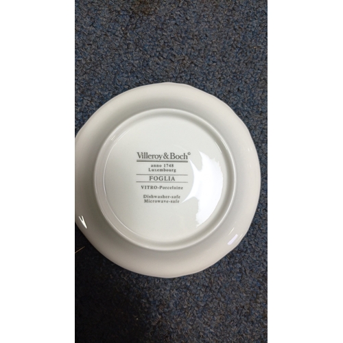 2 - A group of table wares including Villeroy & Boch Foglia Vitro-Porcelaine cups and plates, Savoy lead... 