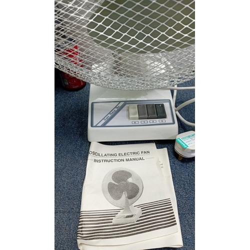 5 - Modern 12in oscillating desk fan, model SD-1207M, with three-speed push-button controls, powder-coat... 