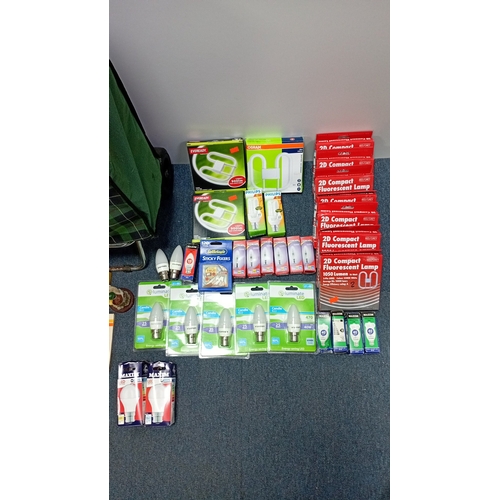 7 - A group of household and DIY sundries including a plaid folding shopping trolley, boxed LED and comp... 