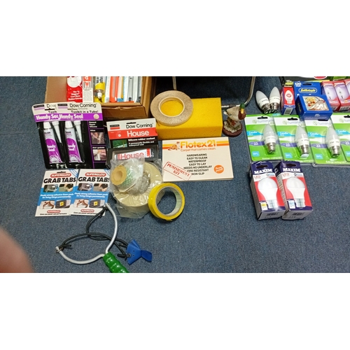 7 - A group of household and DIY sundries including a plaid folding shopping trolley, boxed LED and comp... 