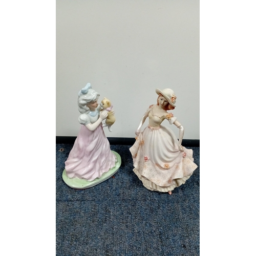 10 - A mixed group of decorative figurines and ornaments, including polychrome bird studies, resin figure... 
