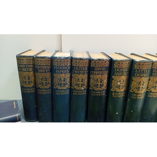 11 - A collection of cloth-bound literature, including a gilt-decorated Charles Dickens ‘London Edition’ ... 