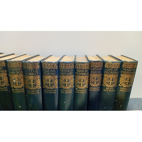11 - A collection of cloth-bound literature, including a gilt-decorated Charles Dickens ‘London Edition’ ... 