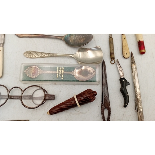 12 - A quantity of assorted small metalwares including sewing thimbles, silverplate souvenir spoons, moth... 