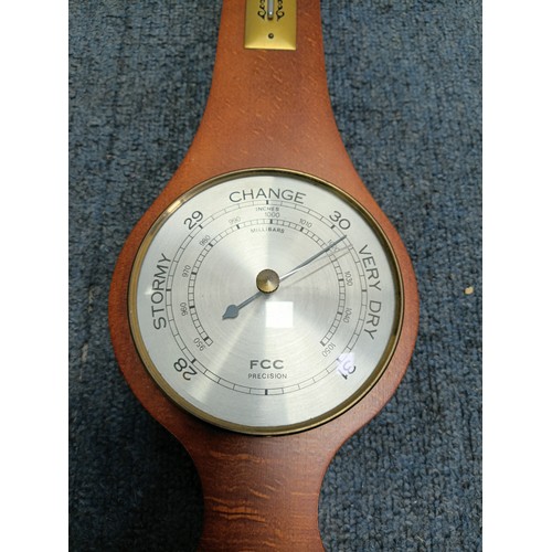 14 - A small group of domestic and smokers’ items comprising an FCC precision barometer/thermometer wall ... 
