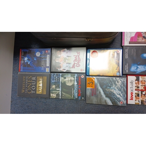 15 - A quantity of commercial DVD and Blu-ray films in original cases, including romance, action, and dra... 
