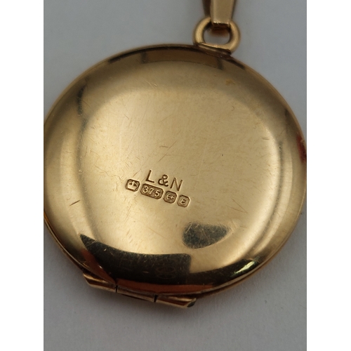 395 - A hallmarked 375 9ct gold locket on a hallmarked 375 9ct gold necklace. 7.12 grams.