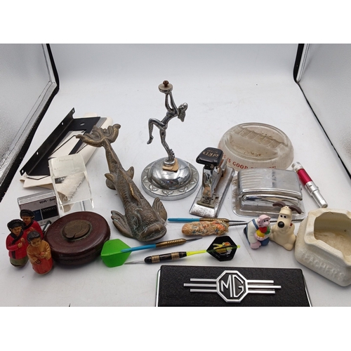 18 - A mixed group of small collectibles and desk accessories, including a cast-metal carp, figural candl... 