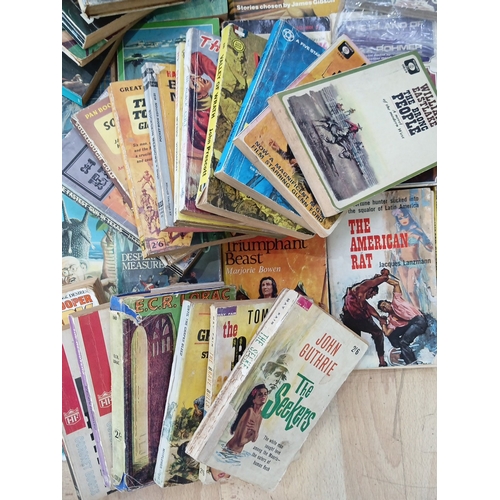 19 - A quantity of 20th-century paperback and hardback books, largely popular fiction and genre titles, i... 