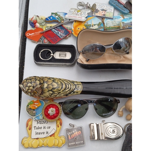 24 - A quantity of assorted novelty souvenirs and small collectibles, including resin and enamel fridge m... 