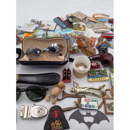 24 - A quantity of assorted novelty souvenirs and small collectibles, including resin and enamel fridge m... 