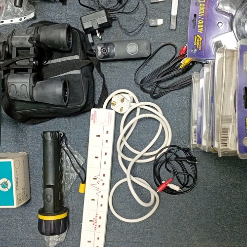 26 - A mixed group of consumer electronics and accessories including binoculars with carry case, TV aeria... 