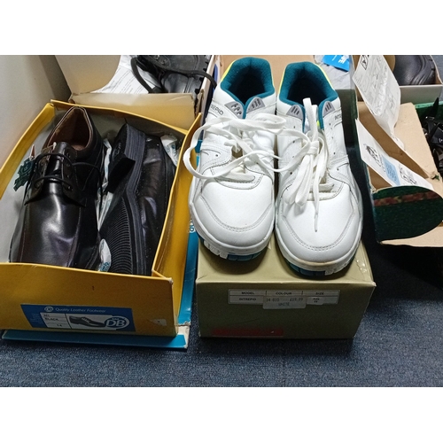 30 - An assortment of boxed footwear and outdoor equipment, including black leather lace-up shoes, black ... 