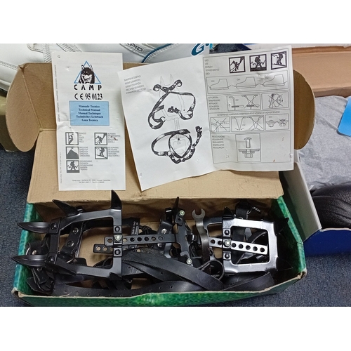 30 - An assortment of boxed footwear and outdoor equipment, including black leather lace-up shoes, black ... 