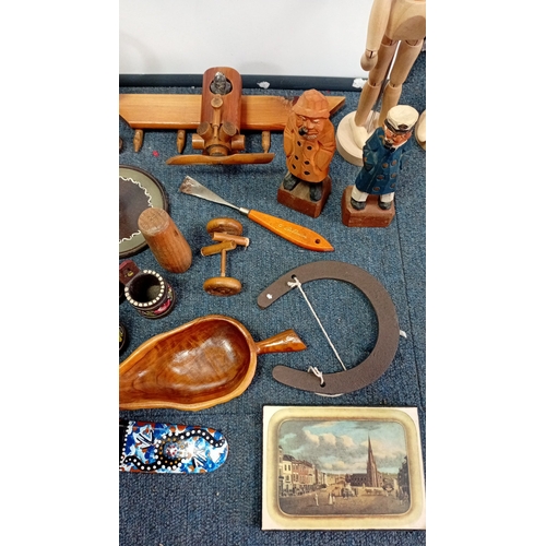 34 - A mixed lot of wood and metal curios, including carved figural sculpture, artist’s lay figures, deco... 