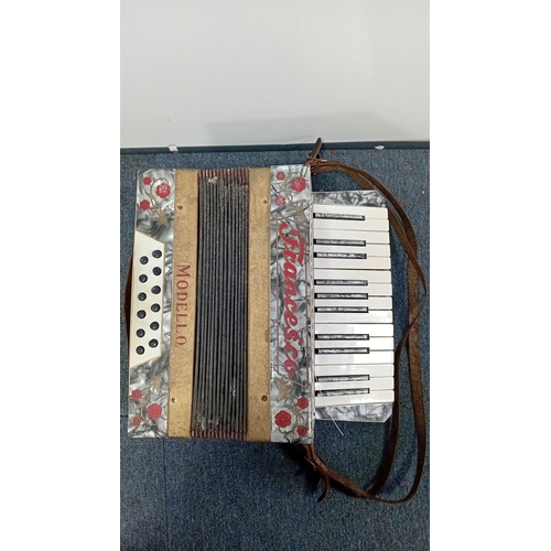 35 - Francesco ‘Modello’ piano accordion, mid-20th century—grey marbled case with red floral decoration, ... 