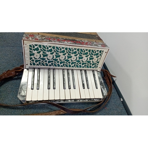 35 - Francesco ‘Modello’ piano accordion, mid-20th century—grey marbled case with red floral decoration, ... 