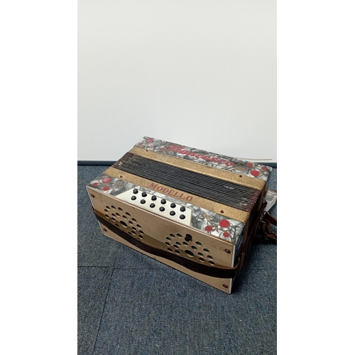 35 - Francesco ‘Modello’ piano accordion, mid-20th century—grey marbled case with red floral decoration, ... 