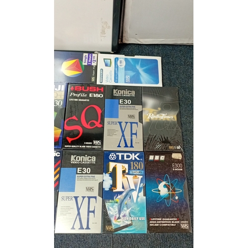 38 - A quantity of VHS blank videocassettes in original retail sleeves, including BASF, Memorex, Grundig,... 