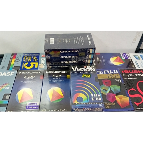 38 - A quantity of VHS blank videocassettes in original retail sleeves, including BASF, Memorex, Grundig,... 