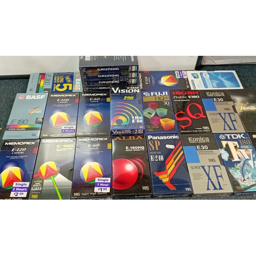 38 - A quantity of VHS blank videocassettes in original retail sleeves, including BASF, Memorex, Grundig,... 